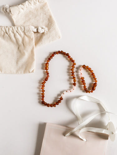 Raw Cognac Baltic Amber and Rose Quartz Kids Necklace Set - Natural, stylish, and safe for babies.