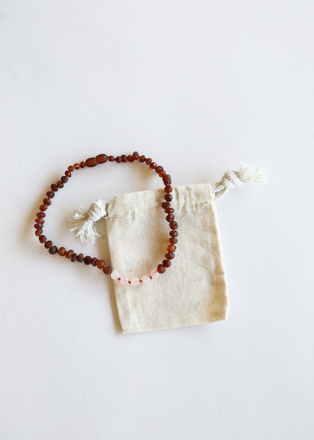 Raw Cognac Baltic Amber and Rose Quartz Kids Necklace Set - Natural, stylish, and safe for babies.
