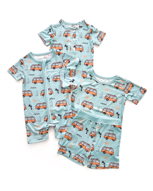 Bamboo jumpsuit for babies in Retro Beach design, angled view showcasing soft fabric and playful style.