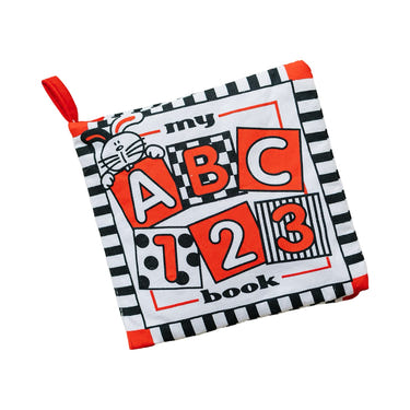 Soft cloth ABC book in high contrast black, white, and red for babies, promoting early learning and visual stimulation.