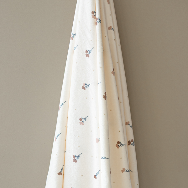 Minky Stretch Luxe Swaddle Blanket in soft fabric, perfect for cozying your baby. Angle 3 view.