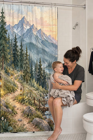Mom holding her baby on the tub edge next to the Mountain Camp Camping shower curtain
