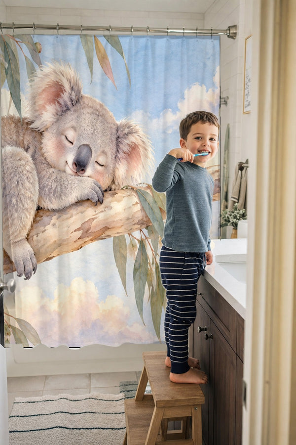 Child brushing teeth in a family bathroom with the Sleepy Koala shower curtain