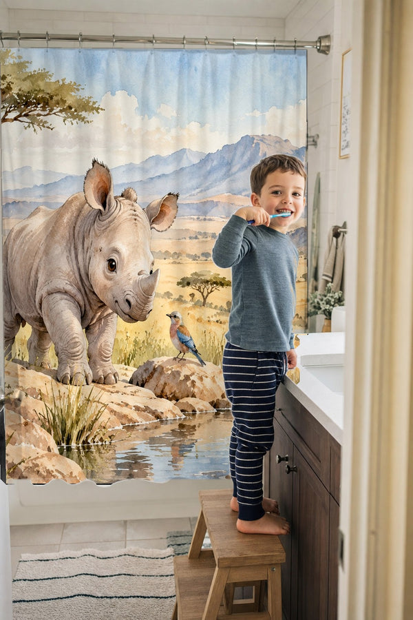 Child brushing teeth in a family bathroom with the Baby Rhino Safari shower curtain