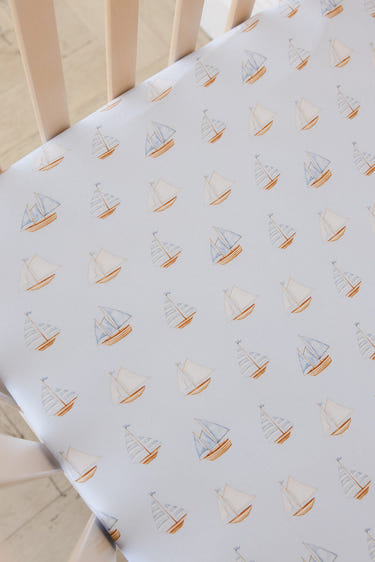 Sailboats crib sheet for baby bedding, featuring a playful nautical design for a cozy sleep environment.