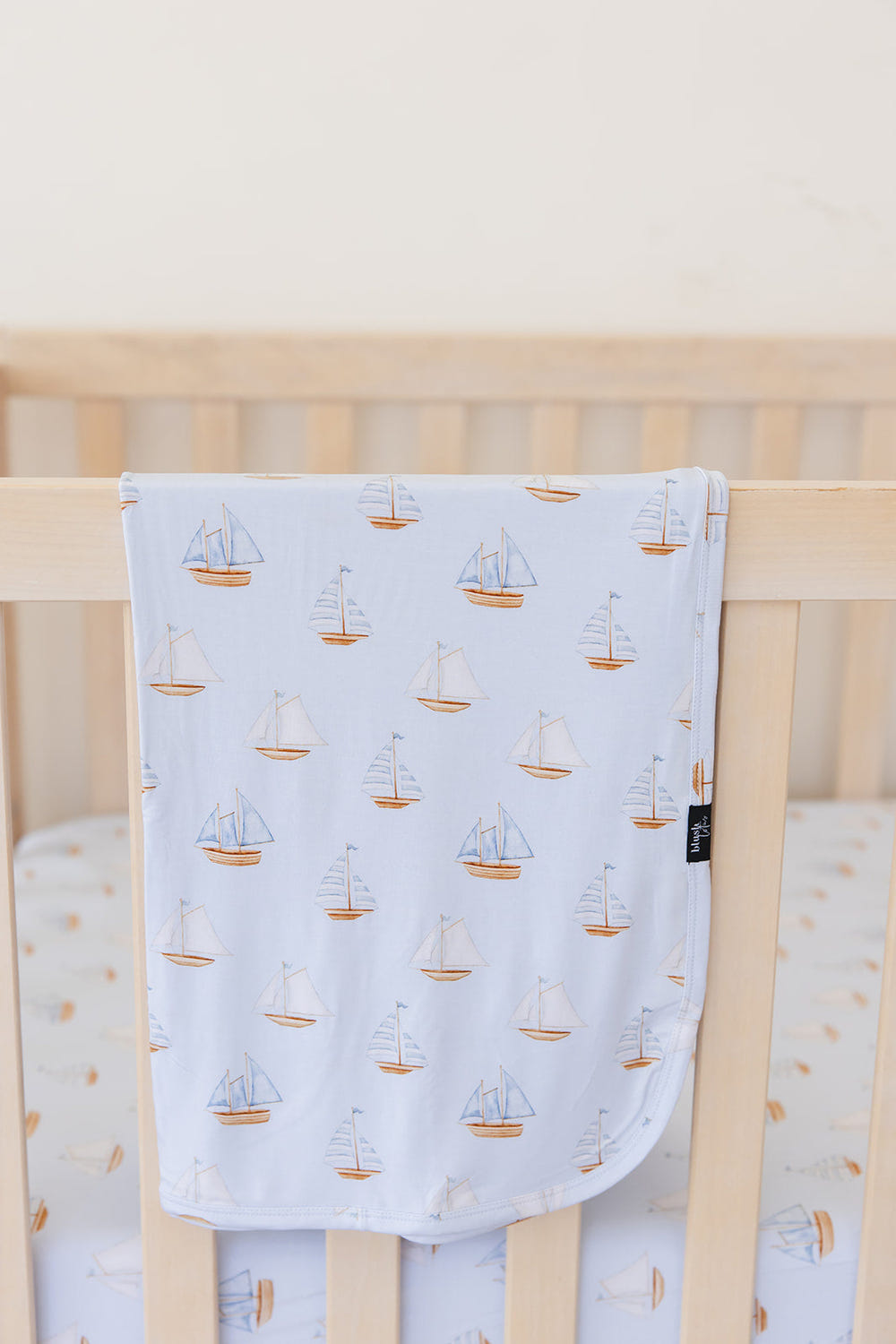 Lightweight sailboat blanket for babies, perfect for swaddling and keeping little ones cozy.