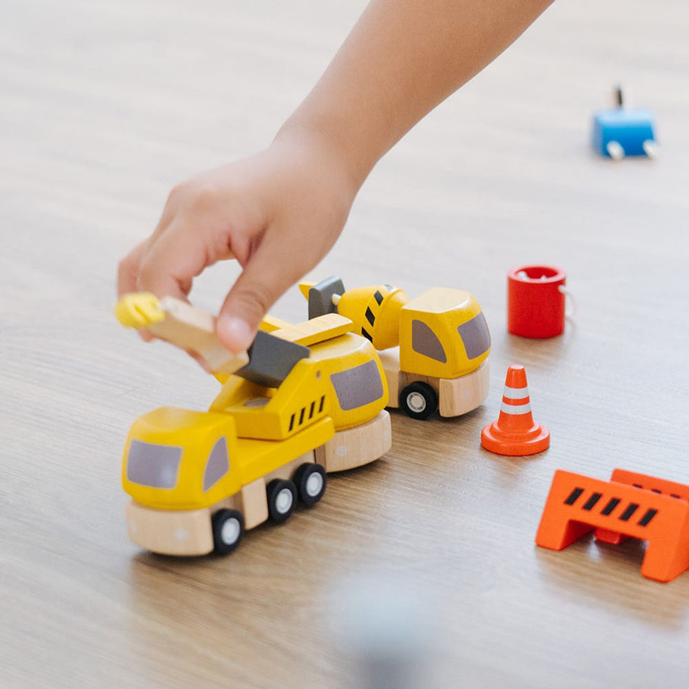 "Highway Maintenance play set for imaginative pretend play, featuring toy vehicles and road signs for kids."