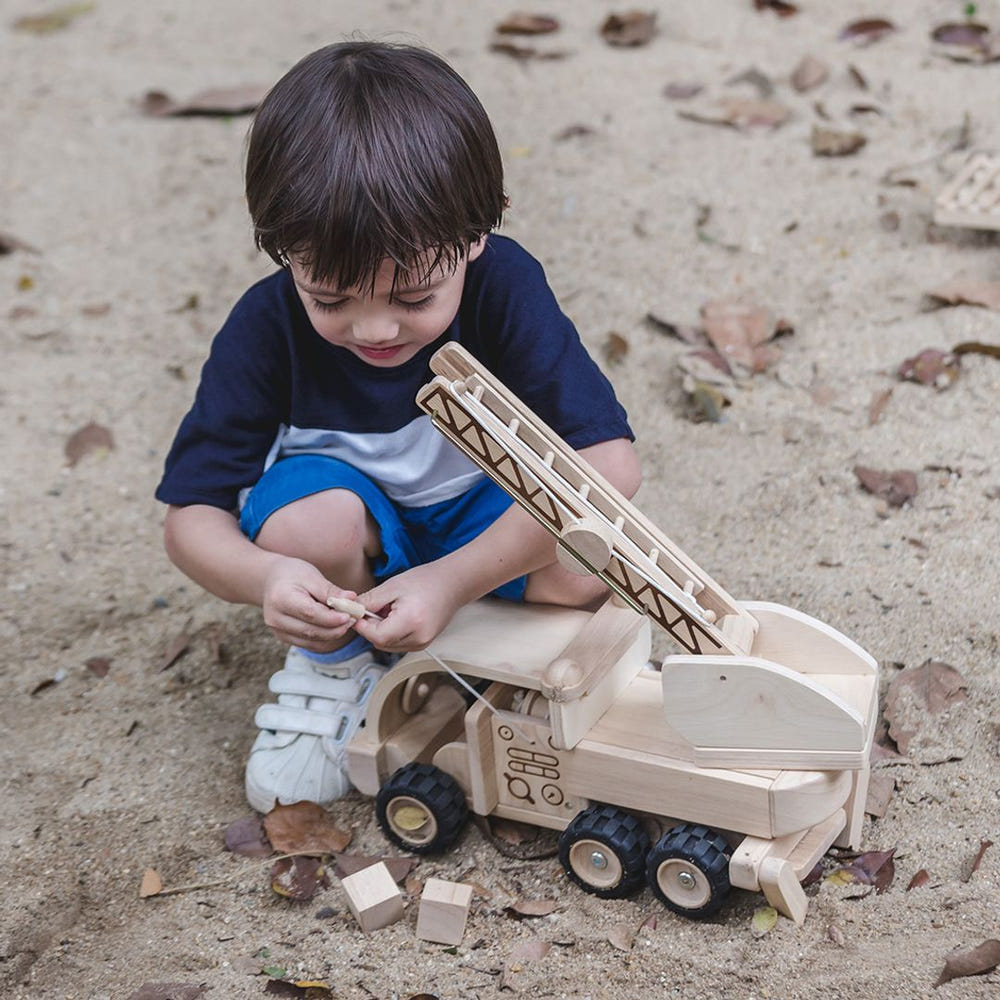 Colorful fire truck toy for imaginative pretend play, perfect for toddlers and young children.