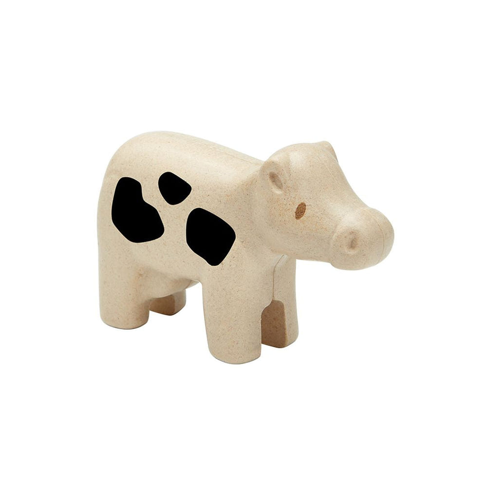 Soft plush cow toy for imaginative pretend play, perfect for babies and toddlers.