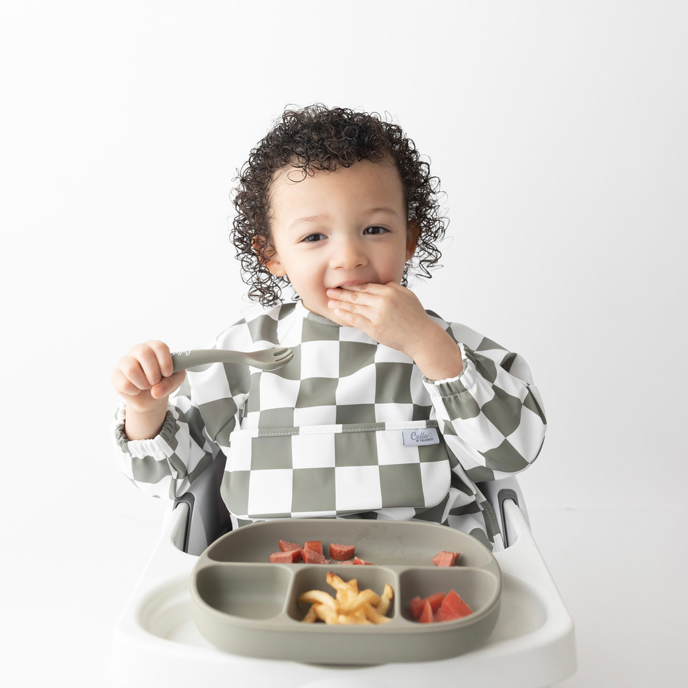 Checkered Grayson Long Sleeve Bib for babies, perfect for mess-free feeding and stylish protection.