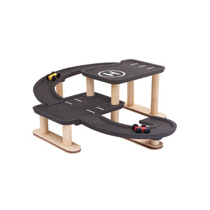 "Race N Play Parking Garage toy for babies, featuring colorful design and multiple levels for fun playtime."