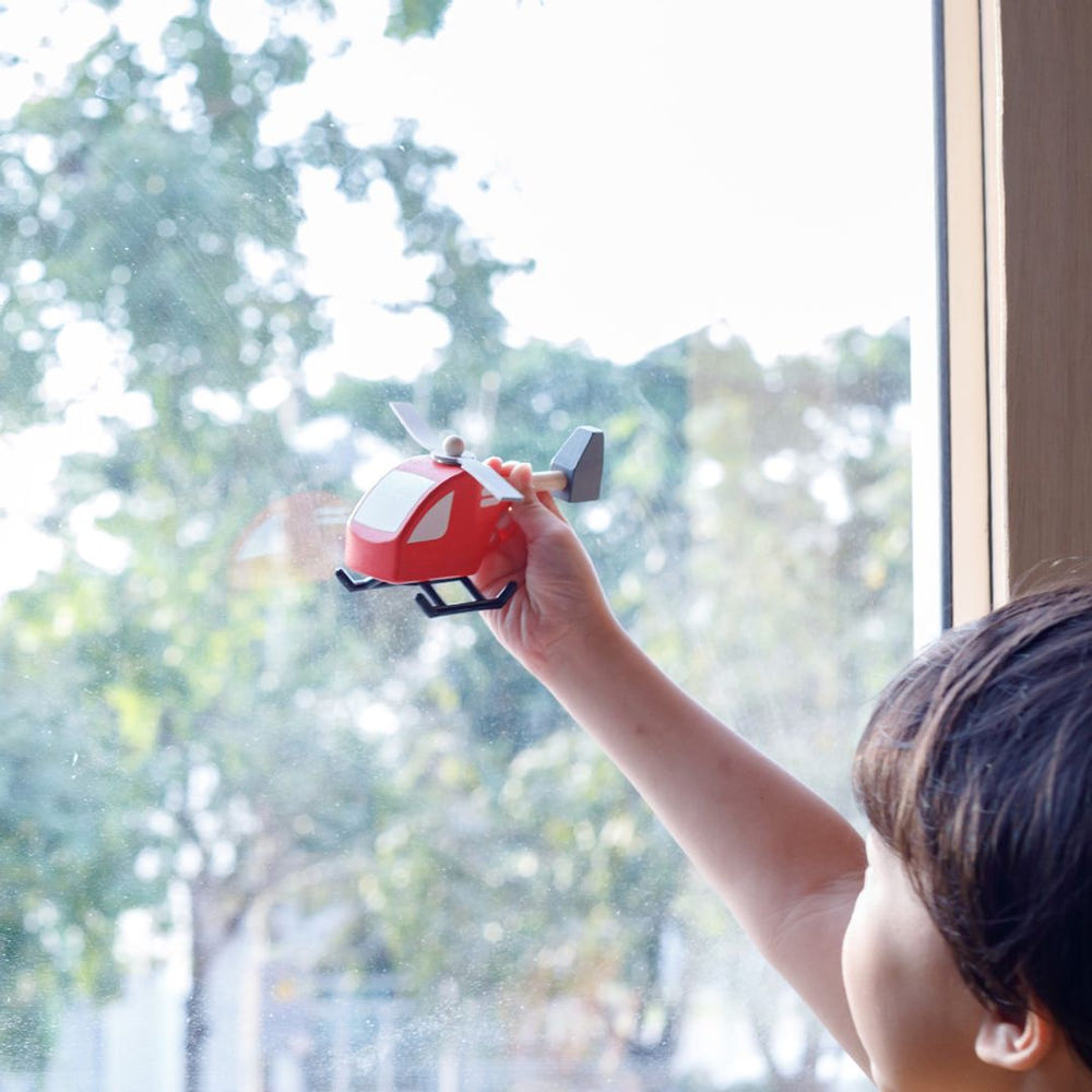 Colorful helicopter toy for imaginative pretend play, perfect for babies and toddlers.