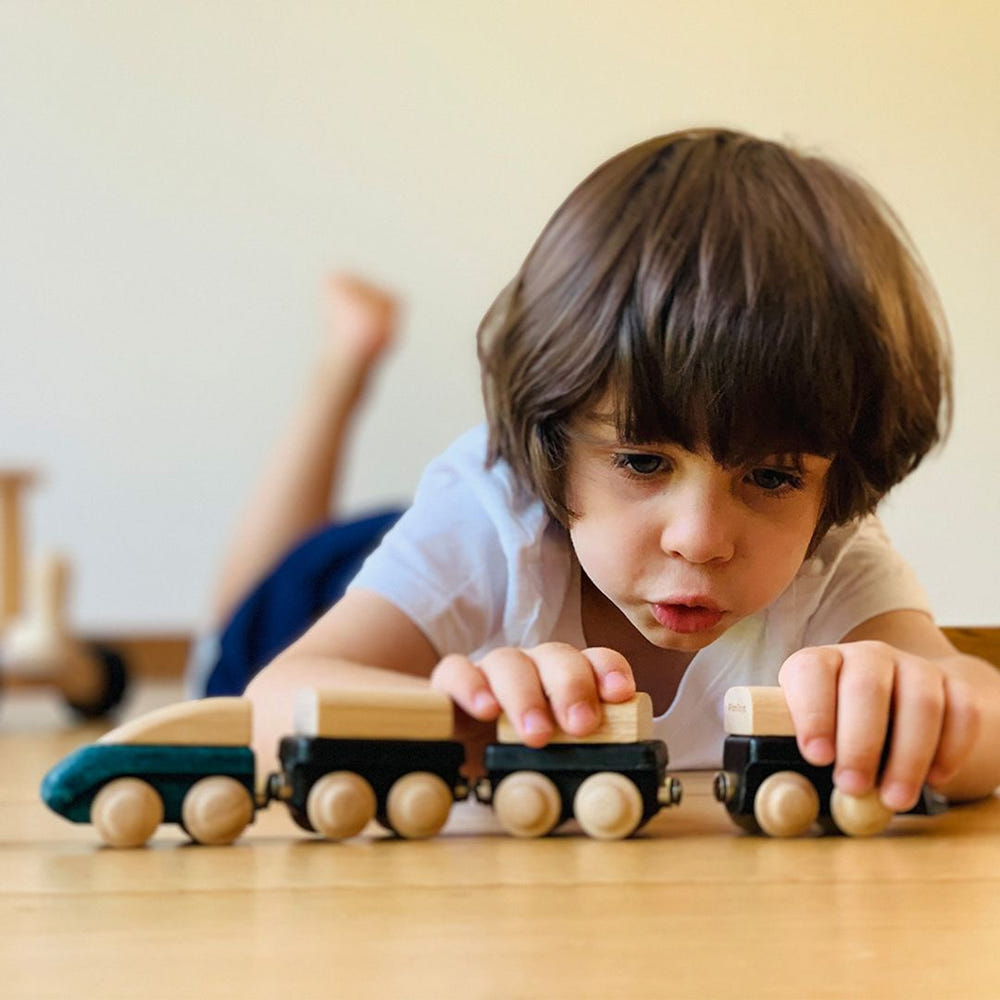 Colorful hybrid train toy for imaginative play, perfect for toddlers and preschoolers.