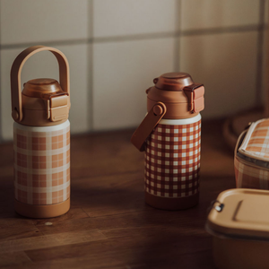Sip + Chug 2 in 1 Thermo Water Bottle 12 oz. in Sienna Gingham, angle view showcasing its stylish design.