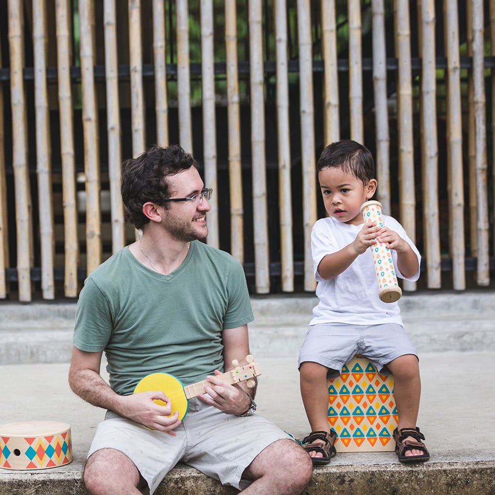 Colorful Rain Maker toy for babies, promoting sensory play and entertainment. Perfect for developing motor skills.