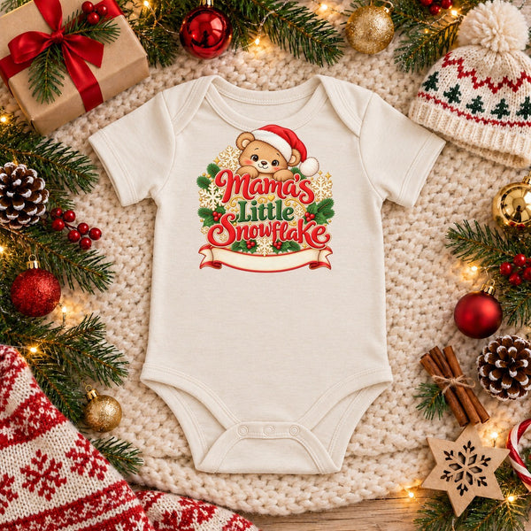 Personalize the Mama's Little Snowflake organic cotton baby bodysuit in natural with your baby's name