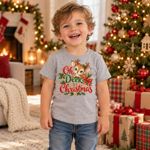 Child wearing the Oh Deer, It's Christmas toddler t-shirt at Christmas