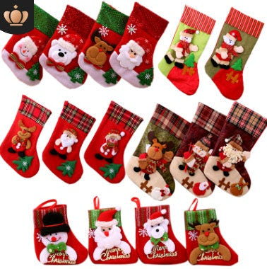 Santa Claus socks with Christmas tree pendant, perfect festive decoration for holiday celebrations.
