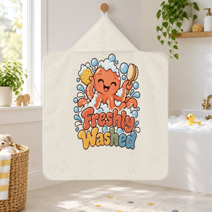 Freshly Washed kids hooded bath towel hanging in a kids bathroom