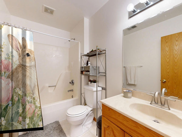 Spring Tulips Bunny shower curtain on a tub shower combo in an American family bathroom