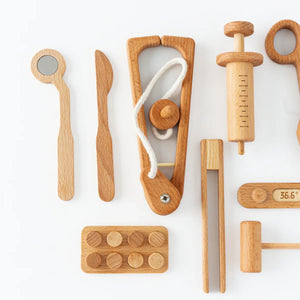 Wooden Doctor Pretend Play Set for kids, featuring Montessori medical tools in an engaging design. Angle 3 view.