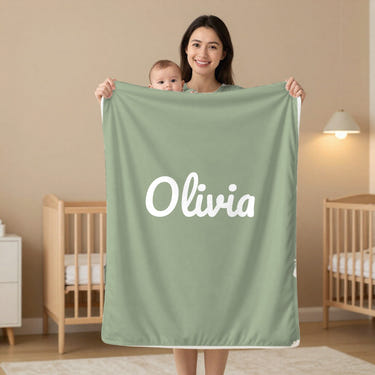Classic Name double sided minky baby blanket in sage, held by a mom