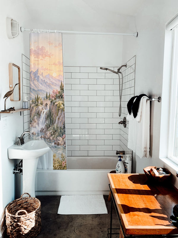 Dreamy Kingdom Fairy Tale shower curtain hanging on the rod over a white bathtub