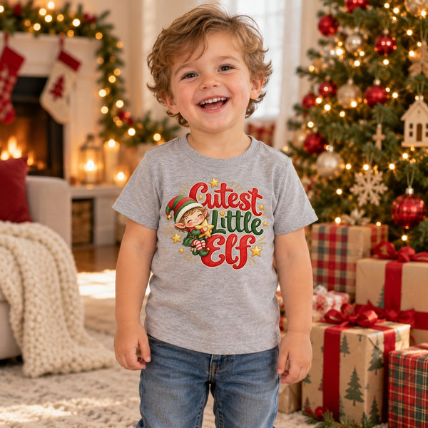 Child wearing the Cutest Little Elf toddler t-shirt at Christmas