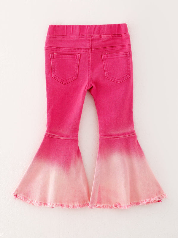 Pink gradient denim flared pants for babies, stylish and comfortable, shown from angle 4.