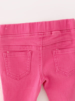 Pink gradient denim flared pants for babies, stylish and comfortable, shown from angle 5.