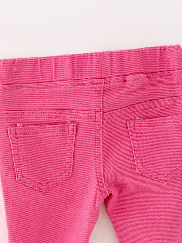 Pink gradient denim flared pants for babies, stylish and comfortable, shown from angle 5.
