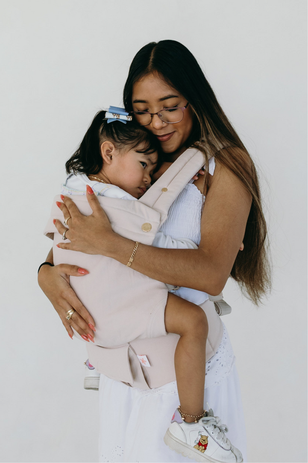 Coco Cream Cotton Linen Baby Carrier for infants 7-35 lbs, shown from angle 2, stylish and comfortable design.