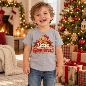 Child wearing the Little Gingerbread toddler t-shirt at Christmas