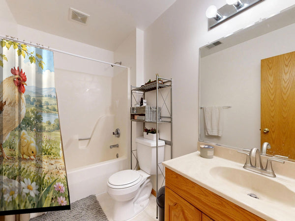 Chicks Field Farm shower curtain on a tub shower combo in an American family bathroom