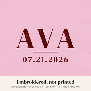 Embroidery close-up, pink bodysuit with maroon thread