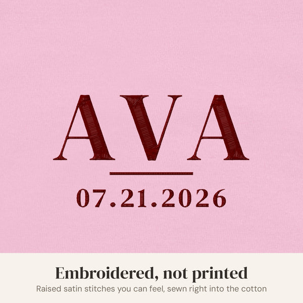 Embroidery close-up, pink bodysuit with maroon thread
