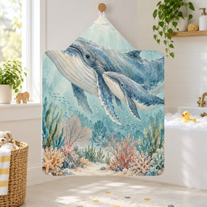 Whale Family Ocean kids hooded bath towel hanging in a kids bathroom