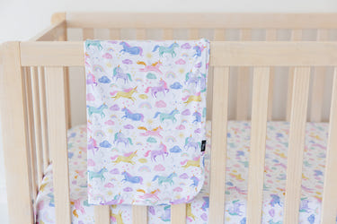 Lightweight Elliana baby blanket, perfect for swaddling and keeping your little one cozy and comfortable.