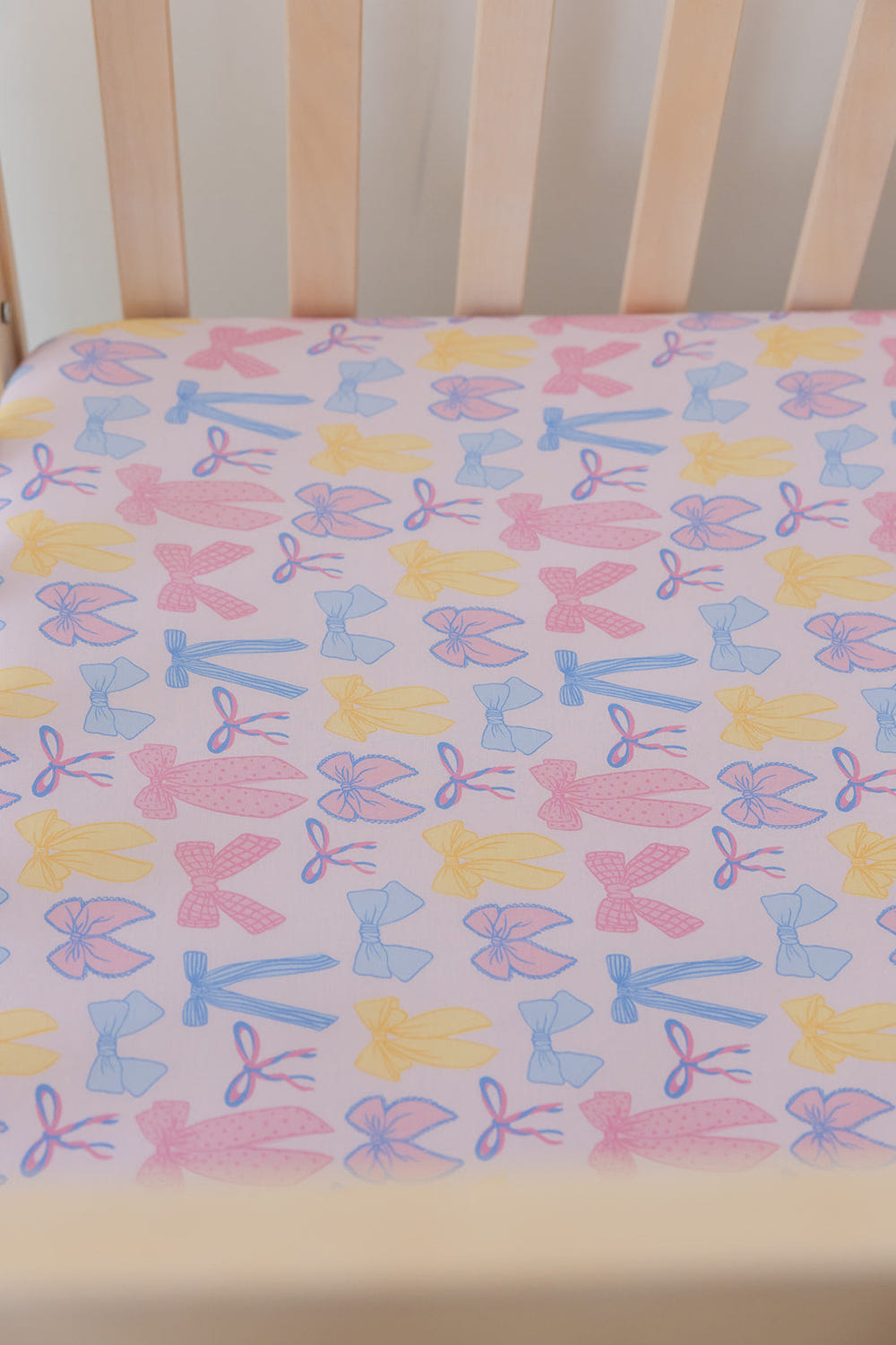 Madelyn crib sheet in soft fabric, perfect for baby bedding and sleep comfort.