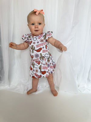 Howdy Darling Baby Twirl Dress in vibrant colors, perfect for playful and stylish little ones.
