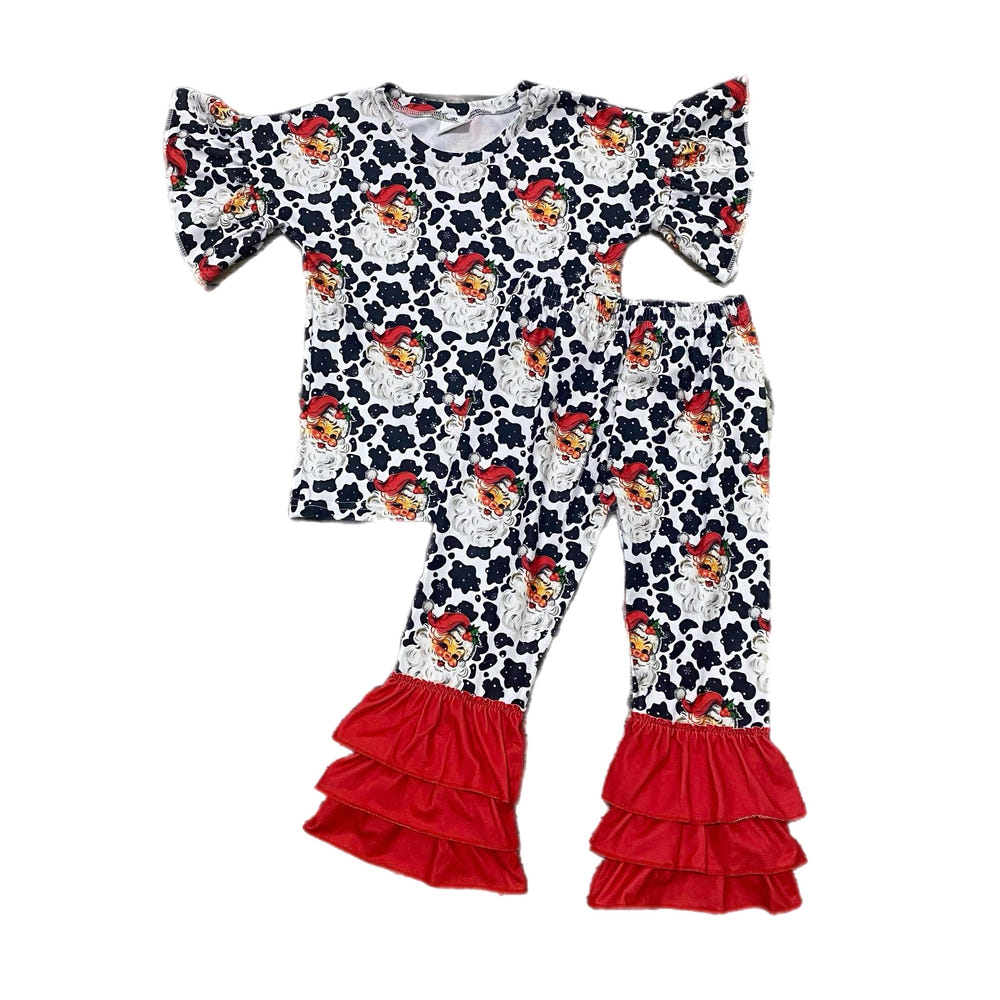 Cow spots Santa two-piece ruffle set for babies, perfect for festive holiday outfits.
