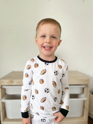 Dream Team Set sleepsuits and pyjamas for babies, shown from angle 4, featuring soft, cozy fabric and adorable design.