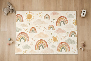 Top view of the Little Rainbows Pattern kids area rug on a wood floor