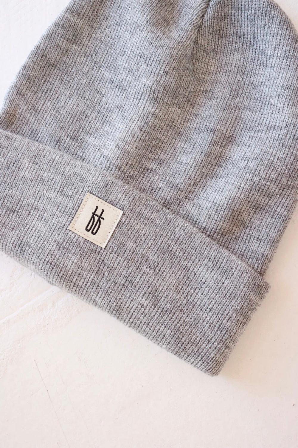 Grey ff Knit Beanie for babies - soft, stylish, and perfect for keeping little heads warm.