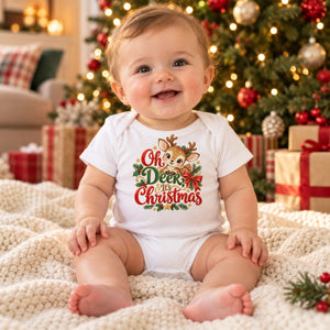 Child wearing the Oh Deer, It's Christmas baby bodysuit at Christmas