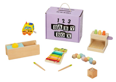 Montessori Educational Box for 11-12 months, featuring engaging toys and soft blankets for sensory development.