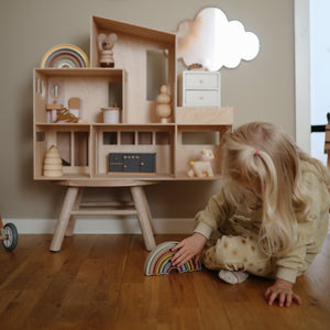 Colorful Rainbow Stacker Toy for babies, showcasing vibrant rings in a playful angle view. Perfect for early learning!