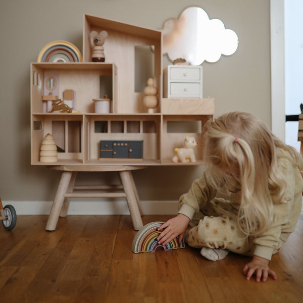 Colorful Rainbow Stacker Toy for babies, showcasing vibrant rings in a playful angle view. Perfect for early learning!