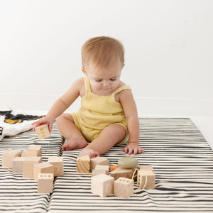 Bold Stripe Organic Cotton Mat for babies, showcasing a colorful design from angle 3, perfect for playtime.