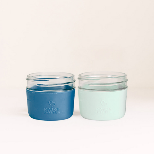 Silicone sleeve 2 pack for baby cups, providing a secure grip and vibrant colors for safe drinking.